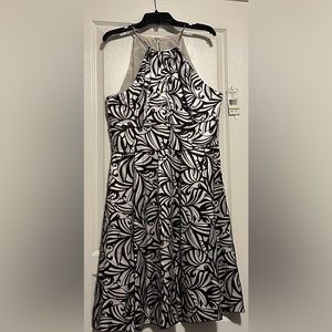 Elegant Black Beauty: White Design Dress